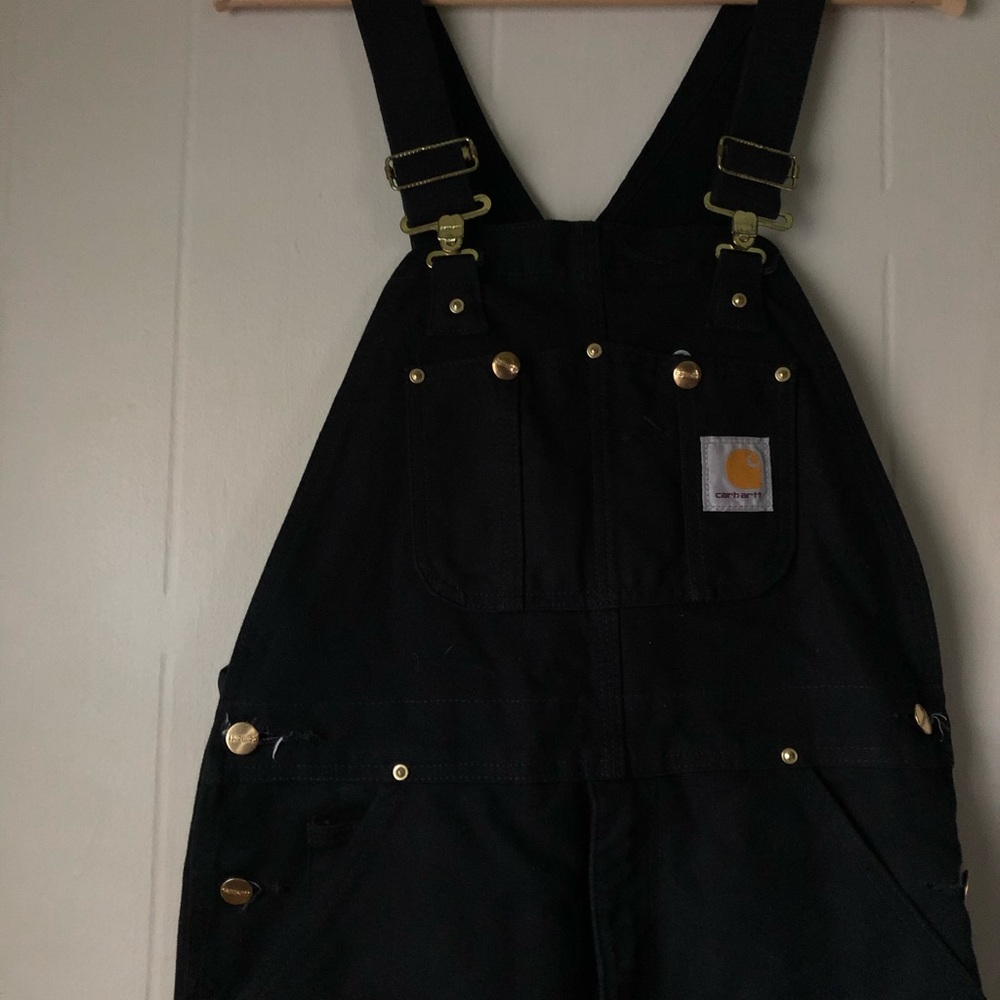 Black Carhartt double knee overalls with gold hardware